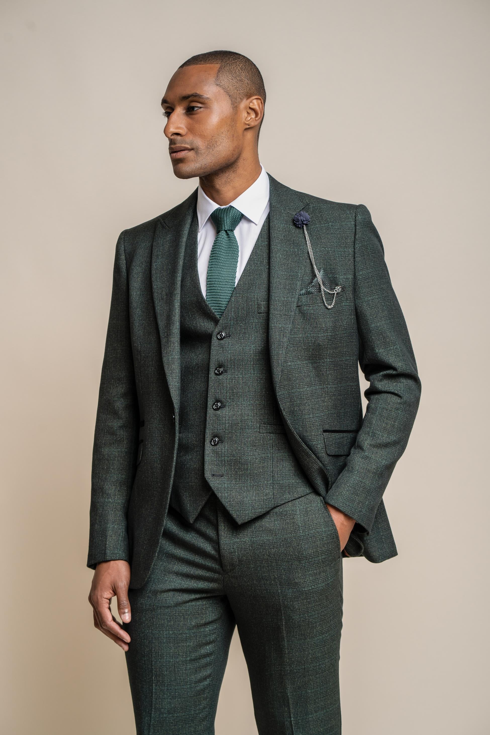 Slim fit glen check tweed 3-piece suit on a man
