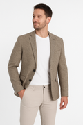 Man wearing beige tweed blazer with vintage car print lining