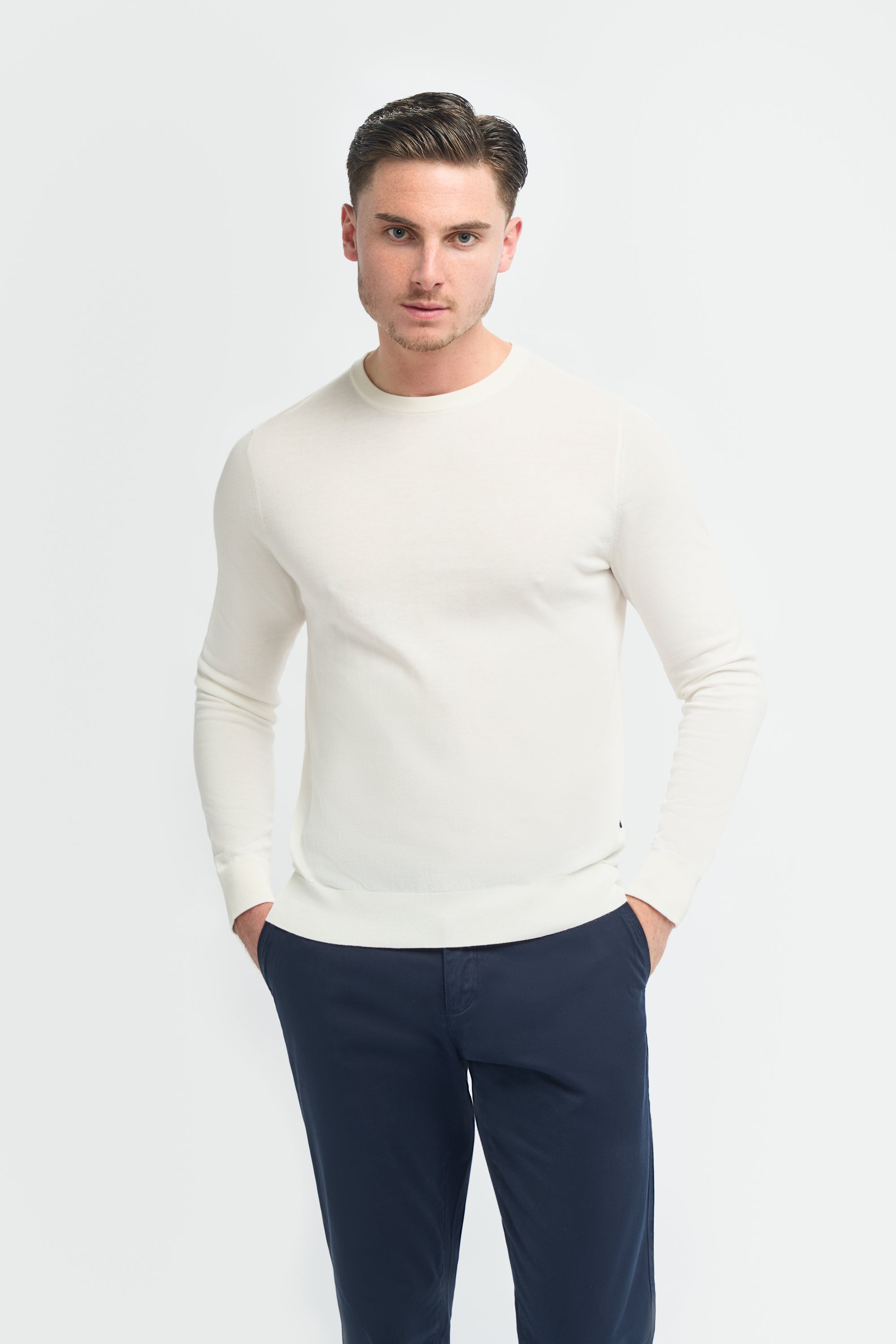 Lightweight cotton crewneck knit jumper on man, slim fit