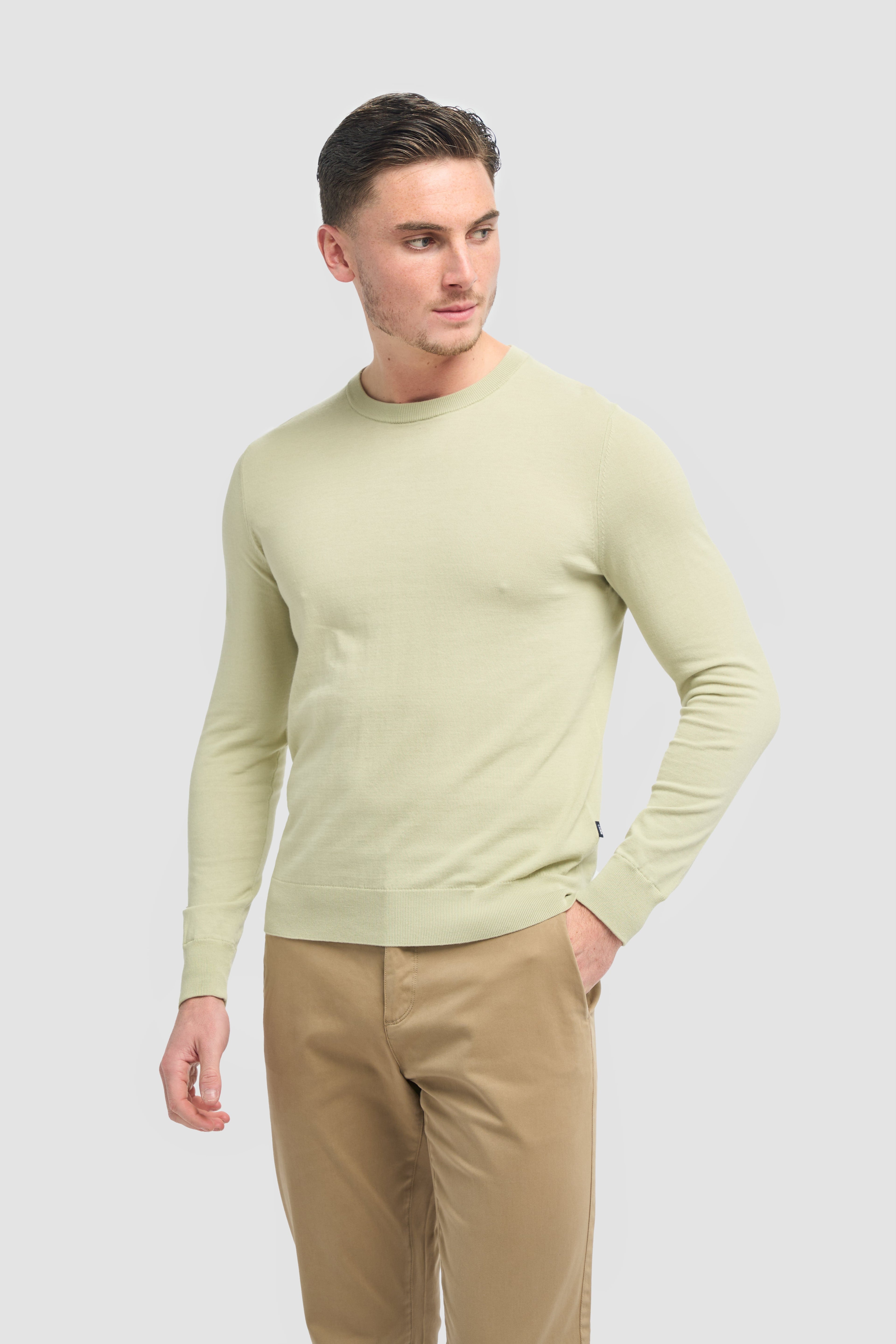 Lightweight cotton crewneck knit jumper on man, slim fit