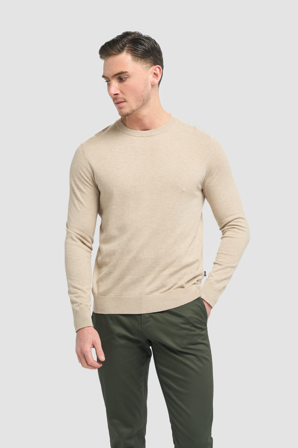 Lightweight cotton crewneck knit jumper on man, slim fit