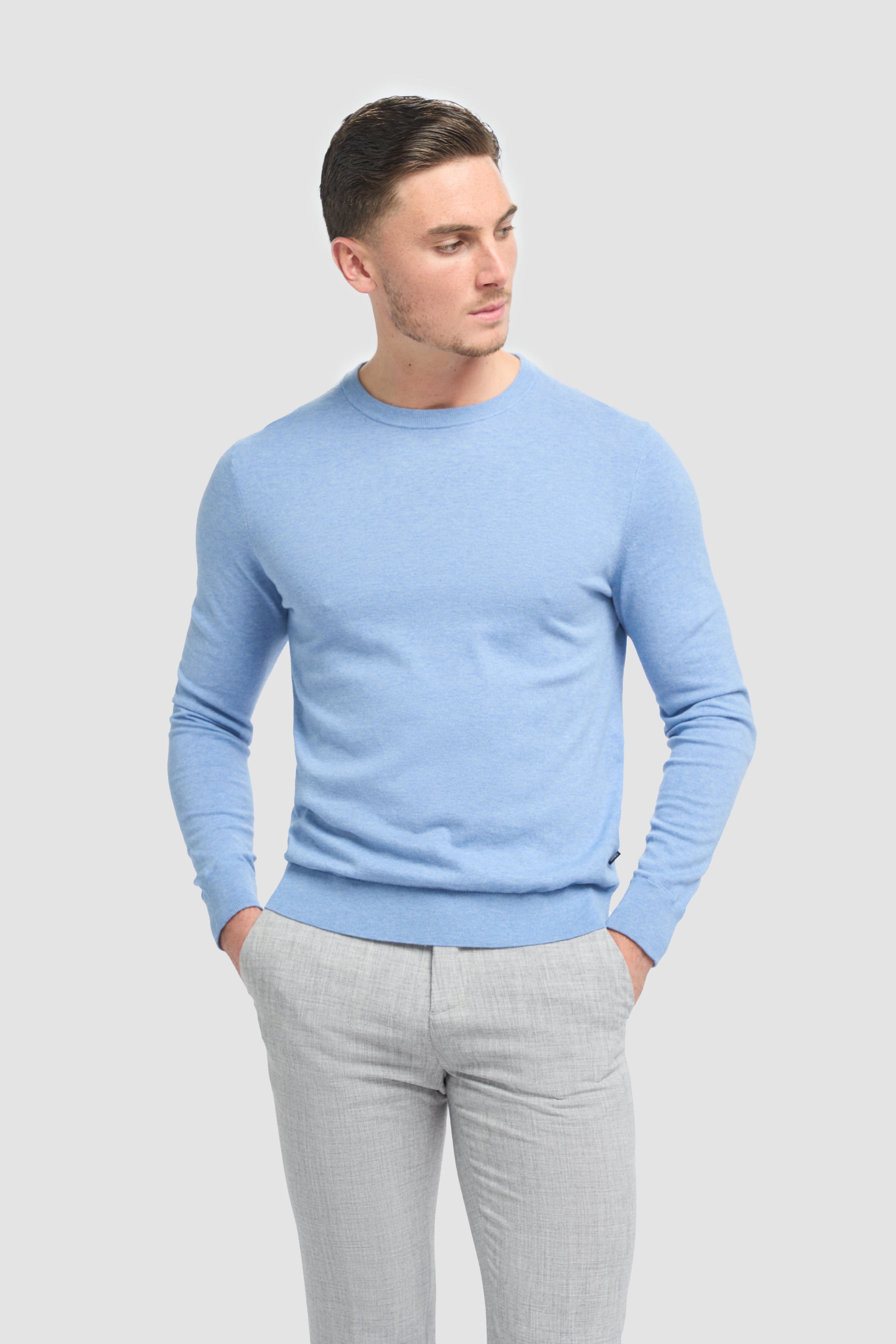Lightweight cotton crewneck knit jumper on man, slim fit