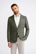 Slim fit forest green houndstooth blazer on male model