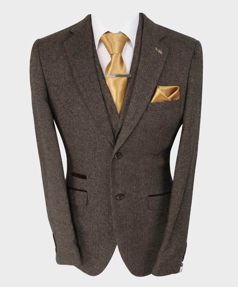 Slim fit grey herringbone tweed blazer on a man
