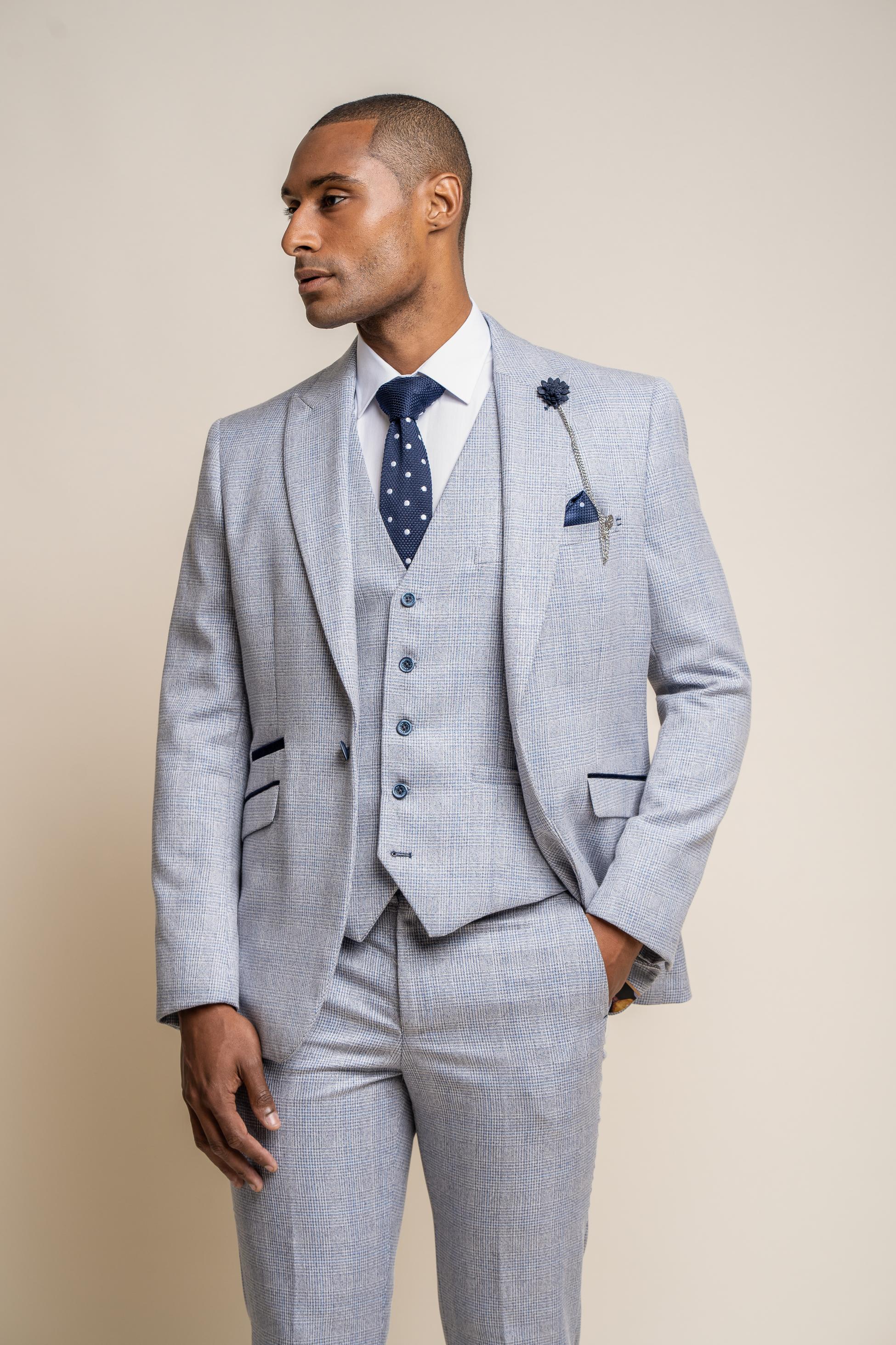 Tailored fit glen check tweed blazer on man, sold separately