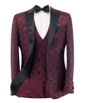 Maroon floral patterned suit with black lapels on a white background